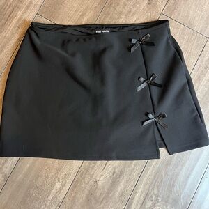 Black Mini Skirt with Bow Details